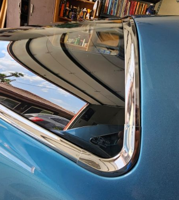 Freshly installed rear glass on a restored classic car by Surpass Auto Glass